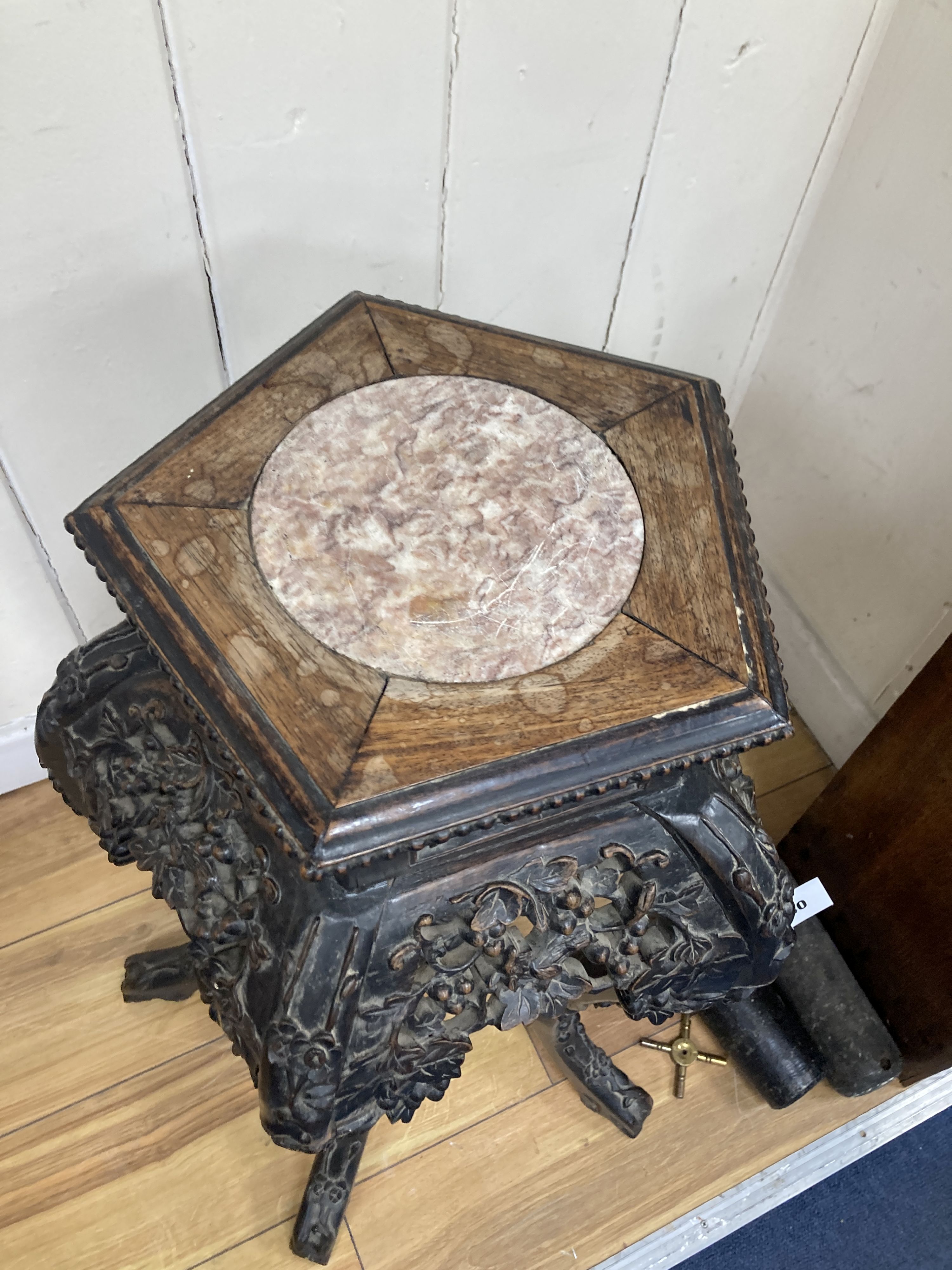 A Chinese marble top carved hardwood jardiniere stand, width 38cm, depth 38cm, height 66cm